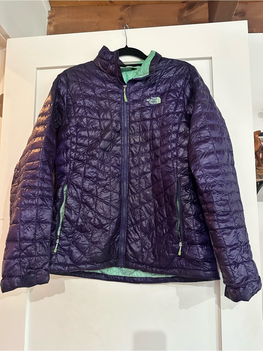 The North Face women’s Purple Thermoball Jacket with Mint Accents